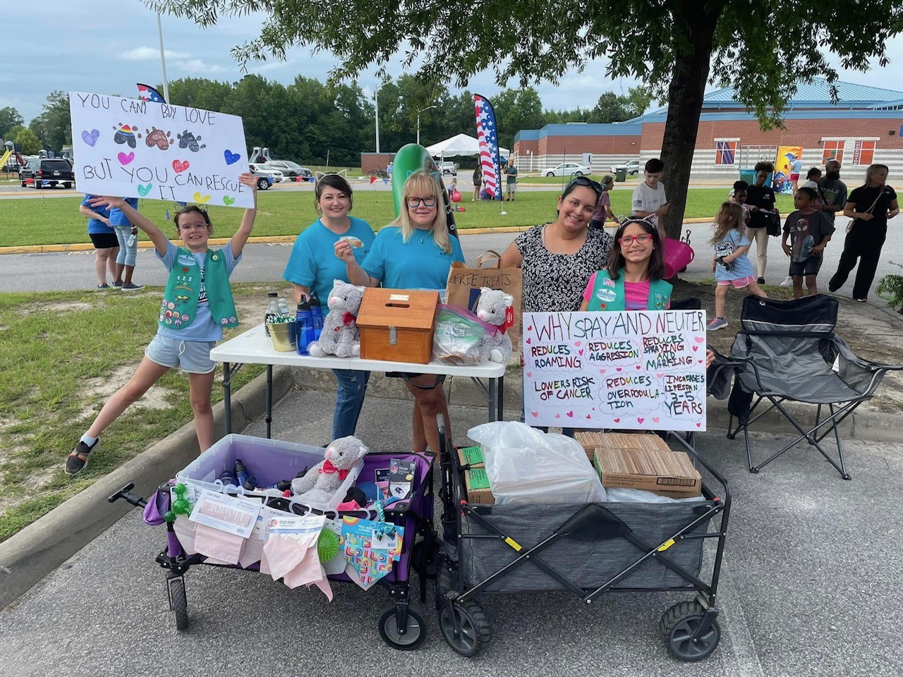 Girl Scout Juniors Evelyn and Lucy from Troop 422 in Suffolk at Creekside Elementary School's ‘National Night Out’ community event