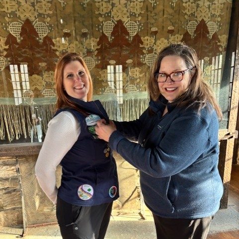 Brittany being pinned by GSCCC CEO Tracy Keller